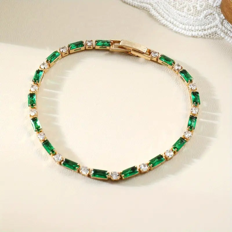 Pulsera Tenis Alternada de Esmeralda en Oro