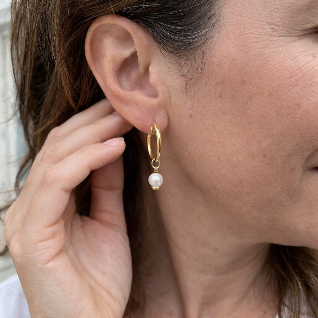 Delia Aretes Blasón | Oro