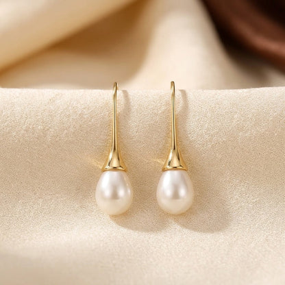 Pendientes Colgantes de Perla en Oro