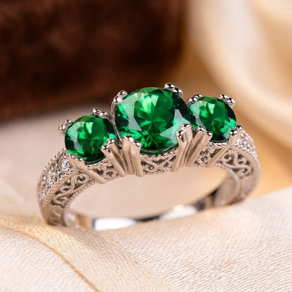 Anillo Tres Piedras de Esmeralda en Plata