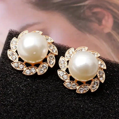 Aretes de Perla y Hojas Brillantes Exquisitos | Oro