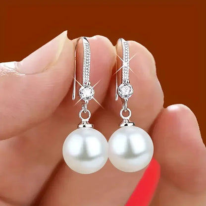 Aretes Colgantes de Zirconia y Perla Lustrosos | Oro Blanco